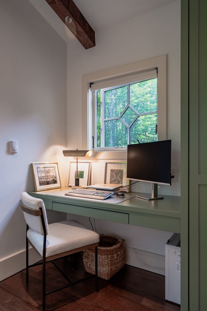 Custom sage built-in desk and cabinetry by FineCraft